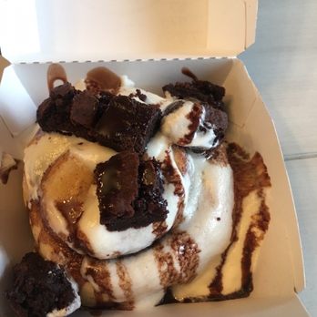 Cinnaholic - Cream cheese frosting, brownie bites, and chocolate sauce - Bakeries Near Me - Naperville, Illinois Cinnaholic - Cream cheese frosting, brownie bites, and chocolate sauce - Bakeries Near Me - Naperville, Illinois