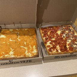 Vodka grandma pie and a grandma pie half pepperoni half sausage. Outstanding! Vodka grandma pie and a grandma pie half pepperoni half sausage. Outstanding!