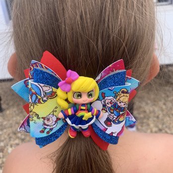 Rail Yards Market - Rainbow Bright custom bow. The figure is made out of clay! - Farmers Market Near Me - Albuquerque, New Mexico