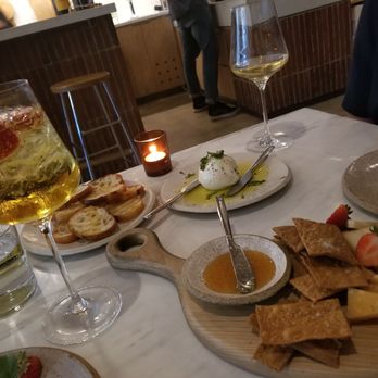 Golden Age Wine - Italian soda, burrata with toast, white wine and cheese board. - Wine Bars Near Me - Mountain Brook, Alabama Golden Age Wine - Italian soda, burrata with toast, white wine and cheese board. - Wine Bars Near Me - Mountain Brook, Alabama