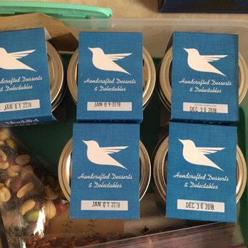Bluebird Cakery - Carefully packing in the cake in a jars for New York - Bakeries Near Me - Vancouver, British Columbia