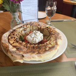 Ciao Bella - We had a fabulous dinner once again . The appetizer we had was a bread bowl with arugula cheese and balsamic . The staff is amazing !