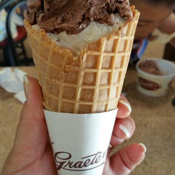 Graeter's Ice Cream - Scoop of Mexican chocolate and toffee chocolate chip in a waffle cone - Desserts Near Me - Northbrook, Illinois Graeter's Ice Cream - Scoop of Mexican chocolate and toffee chocolate chip in a waffle cone - Desserts Near Me - Northbrook, Illinois
