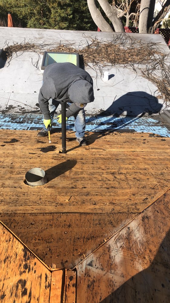 Slide of Rafael’s Tear-off & Hauling