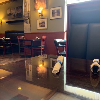 Jackie Blu's - Dining room is decorated with art and photos. - American Near Me - Bryan, Ohio