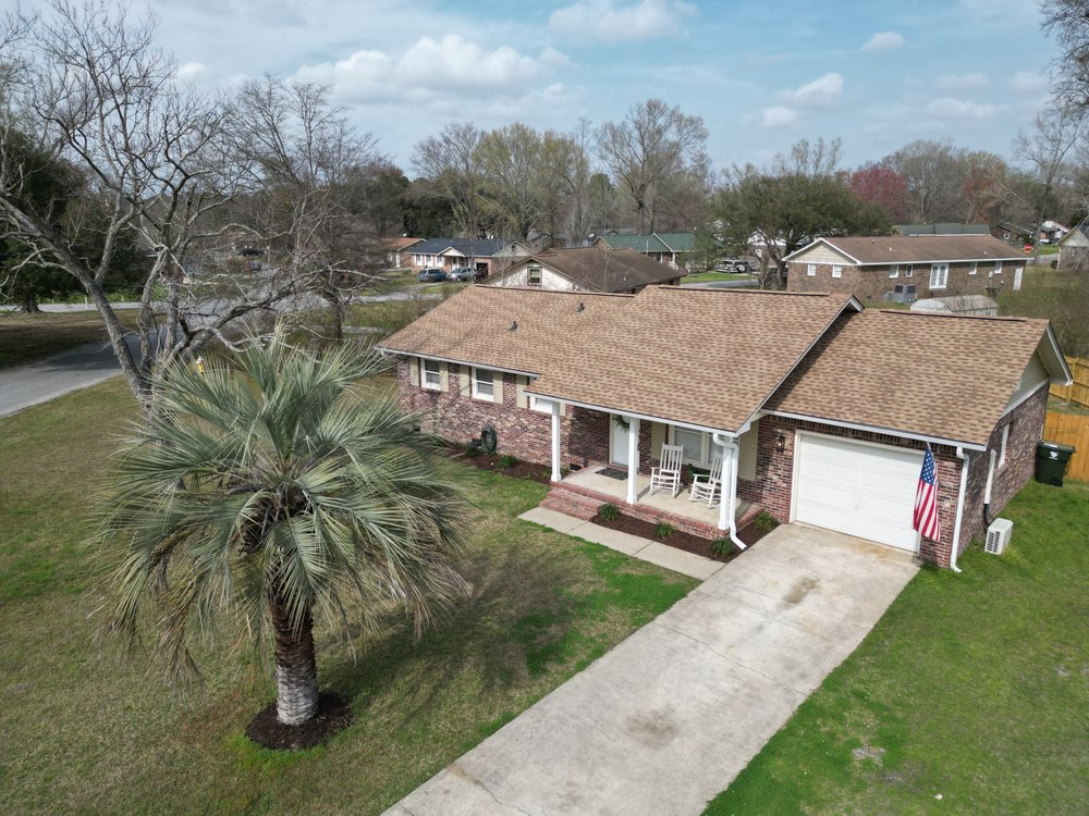 Slide of CMS Roofing