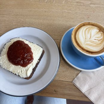 The Mill - Lemon ricotta toast w/ seasonal compote + oat milk cappuccino - Coffee & Tea Near Me - San Francisco, California The Mill - Lemon ricotta toast w/ seasonal compote + oat milk cappuccino - Coffee & Tea Near Me - San Francisco, California