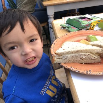 Leaping Lizard Cafe - Happy Toddler with his turkey sandwich and chips! - Cafes Near Me - Virginia Beach, Virginia Leaping Lizard Cafe - Happy Toddler with his turkey sandwich and chips! - Cafes Near Me - Virginia Beach, Virginia