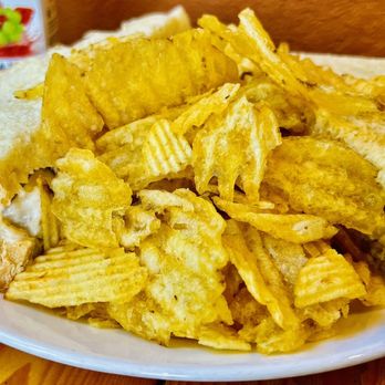 Numinous Coffee Roasters - a plate of chips and a sandwich - Coffee & Tea Near Me - Marble Falls, Texas