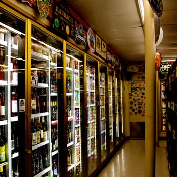 Sunrise Mini Mart - a row of bottles of wine - Convenience Stores Near Me - Austin, Texas