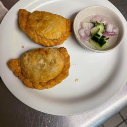 Twist On Thai Cafe - Chicken Puffs, Homemade pastries stuffed with minced chicken, diced potatoes, chopped onions, diced carrots and turmeric curry powder.