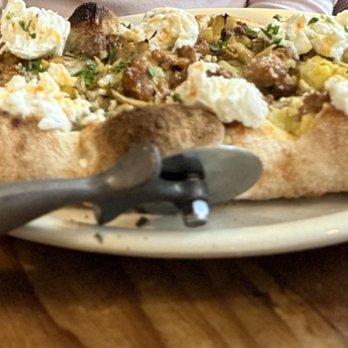 Montesacro SOMA - Their namesake pinsa, the "Montesacro" : Mozzarella, Lamb Sausage, Artichoke, and Potato. - Italian Near Me - San Francisco, California Montesacro SOMA - Their namesake pinsa, the "Montesacro" : Mozzarella, Lamb Sausage, Artichoke, and Potato. - Italian Near Me - San Francisco, California