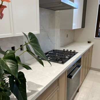 Stone Work Details - Showroom Kitchen Countertop With Full Backsplash - Countertop Installation Near Me