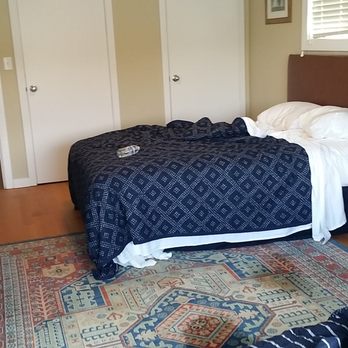 Jenner Inn - Rosewater Cottage Bedroom standing at the foot of the second bed looking in. - Hotels Near Me - Jenner, California