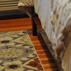 GreenLife Inn at Mimosa - Original floors make for an interesting room highlight.