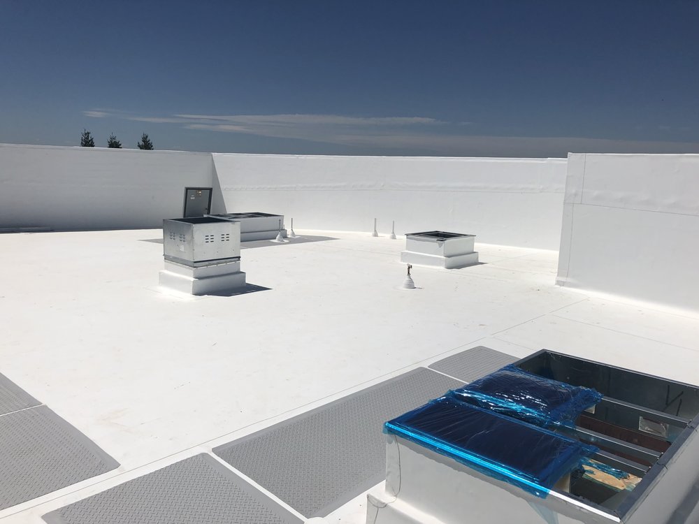 Slide of Samperios Roofing