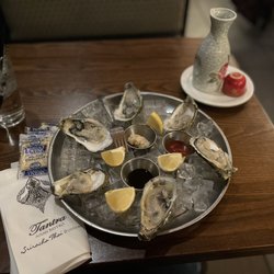Sriracha Thai Bistro & Oyster Bar - Oysters on the half shell, warm sake = deliciousness