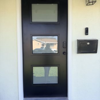 Eddie Fixes - Outdoor view of door installation - with fresh paint on outside wall! - Painters Near Me Eddie Fixes - Outdoor view of door installation - with fresh paint on outside wall! - Painters Near Me