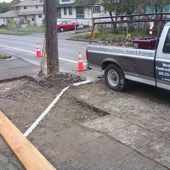 Warden Construction - New drainage to curb discharge - Plumbing Near Me