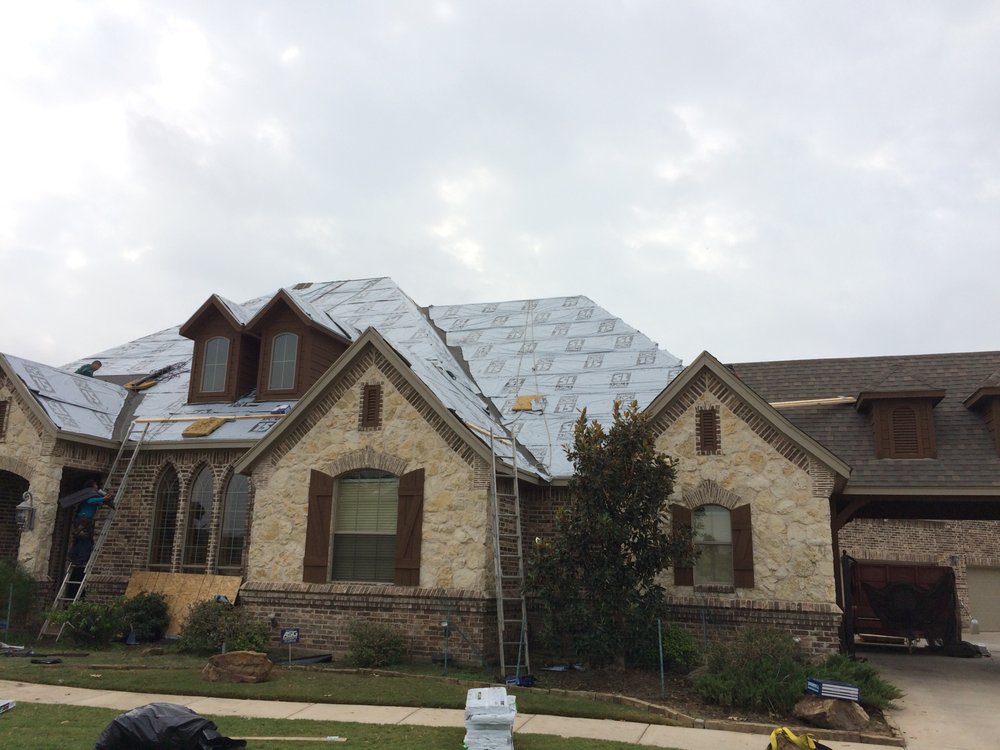 Slide of Greyhawk Roofing