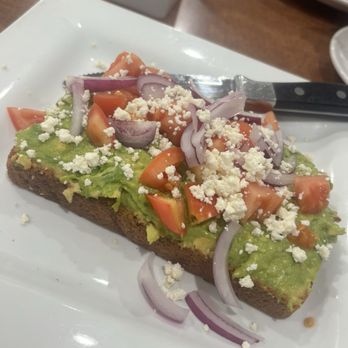 The Corner Grill & Bakery - Humus avocado toast with balsamic on the side. - American Near Me - Claremont, California The Corner Grill & Bakery - Humus avocado toast with balsamic on the side. - American Near Me - Claremont, California