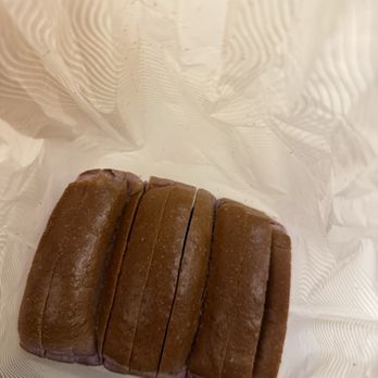Tous Les Jours - Purple, sweet potato loaf from a top view - Bakeries Near Me - Henderson, Nevada Tous Les Jours - Purple, sweet potato loaf from a top view - Bakeries Near Me - Henderson, Nevada
