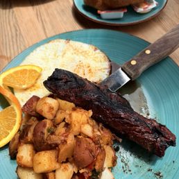 Hanger steak with eggs and country potatoes