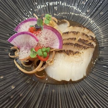 Camille - Scallop with a riff on banana blossom salad. Again, PERFECT balance in this dish. - French Near Me - Orlando, Florida