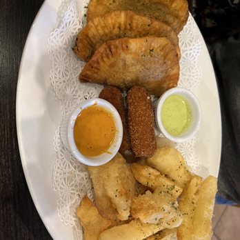 K’Bola - K'bolá Combo: ground beef empanadas, ham croquettes and yuca fries - Cuban Near Me - Williamsburg, Virginia K’Bola - K'bolá Combo: ground beef empanadas, ham croquettes and yuca fries - Cuban Near Me - Williamsburg, Virginia