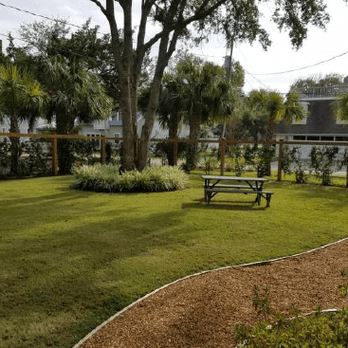 Saunders Landscape Services - a garden with a picnic table - Landscaping Near Me - Saint Simons Island, Georgia Saunders Landscape Services - a garden with a picnic table - Landscaping Near Me - Saint Simons Island, Georgia