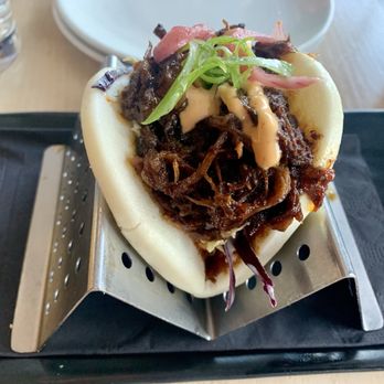 Industry Kitchen - Bao bun...chewy (overcooked) braised beef, but the smoky sauce rescues the dish. - American Near Me - New York, New York