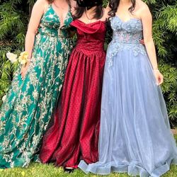 Glitzy - Prom dresses- green and blue dresses from Glitzy.