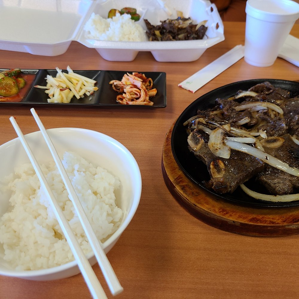 Dosirak Korean Cafe - This is the galbi I usually order! It's delicious short ribs that she cuts table side; it comes with the sides and rice! - Korean Near Me - Conroe, Texas