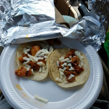 El Primo Express - two tacos on a paper plate - Food Trucks Near Me - Jackson, Tennessee