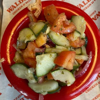 Waldo's Chicken and Beer - Cucumber and tomato salad - Chicken Shop Near Me - Prospect, Kentucky Waldo's Chicken and Beer - Cucumber and tomato salad - Chicken Shop Near Me - Prospect, Kentucky