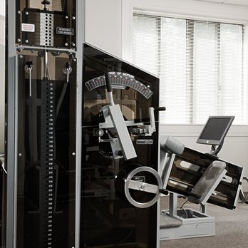 Exercise Defined - The MedX Medical Lumbar, used to build strength and relieve pain in the lumbar spine of the lower back. - Trainers Near Me - Washington, DC, District of Columbia