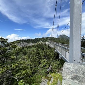 Mile High Swinging Bridge - Looking across the bridge towards the mountain top - Landmarks & Historical Buildings Near Me Mile High Swinging Bridge - Looking across the bridge towards the mountain top - Landmarks & Historical Buildings Near Me