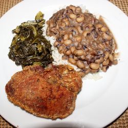 Fried pork chop greens black eyed peas and rice