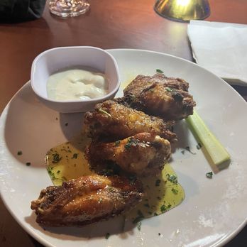 Indigo Room - 6 wing Appetizer. (Spilt Baked Honey Jerk & Lemon Pepper) we ate two before pic was Taken. - Wine Bars Near Me - Smyrna, Georgia