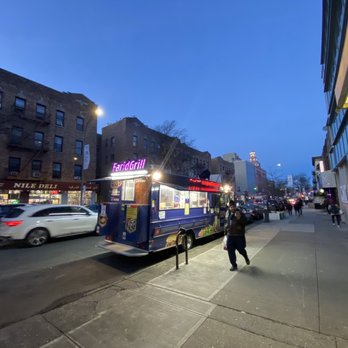 Farid Kebab - a street scene at night - Halal Near Me - Astoria, New York