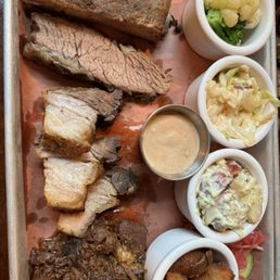 BBQ Chopped Prime Brisket, Pork Belly, Pork Ribs, Sliced Prime Brisket, Steamed Veggies, Slaw, Potato Salad, Crispy Potato Bites BBQ Chopped Prime Brisket, Pork Belly, Pork Ribs, Sliced Prime Brisket, Steamed Veggies, Slaw, Potato Salad, Crispy Potato Bites