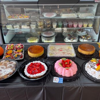 Panaderia El Angel - sliced cakes, cheesecake with strawberry jelly and jello - Bakeries Near Me - Arlington, Texas Panaderia El Angel - sliced cakes, cheesecake with strawberry jelly and jello - Bakeries Near Me - Arlington, Texas