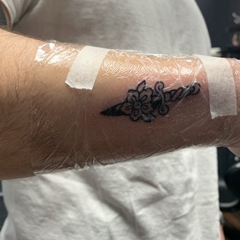 Tattoos And Smoke - Husbands matching dagger with flower - Tattoo Near Me - Las Vegas, Nevada