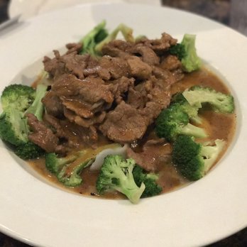 Thai Chili - Chef's special stir fried flat rice noodles with grilled chicken, beef or pork in a peanut sauce, served with steamed broccoli. - Thai Near Me - San Antonio, Texas Thai Chili - Chef's special stir fried flat rice noodles with grilled chicken, beef or pork in a peanut sauce, served with steamed broccoli. - Thai Near Me - San Antonio, Texas