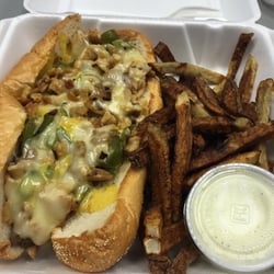 Woody's Ale House & Grille - Honey Dijon Chicken Cheesesteak and fries! Lunch to-go...