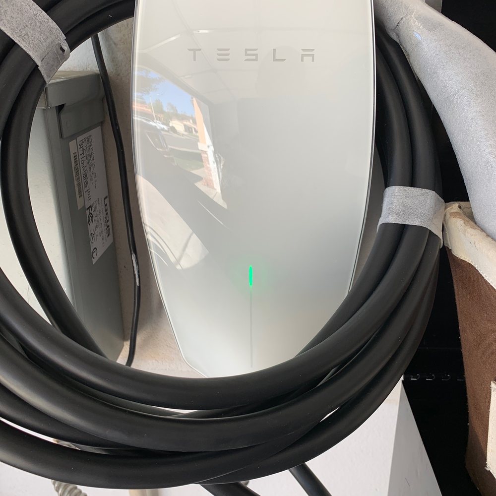 Nicks Electric - Tesla wallcharfer - Electricians Near Me Nicks Electric - Tesla wallcharfer - Electricians Near Me