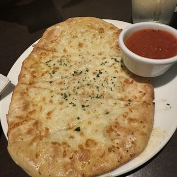 Oliveto Italian Bistro - Hearth-Baked Cheese Bread - Italian Near Me - Moore, Oklahoma Oliveto Italian Bistro - Hearth-Baked Cheese Bread - Italian Near Me - Moore, Oklahoma