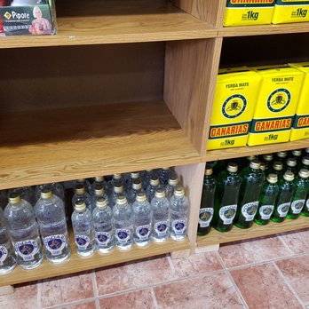 Rincon De Espana - a shelf full of bottles of water - Grocery Near Me - Mississauga, Ontario Rincon De Espana - a shelf full of bottles of water - Grocery Near Me - Mississauga, Ontario