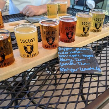 Locust Cider Fort Collins - Flight time! Nice that you can do as many or as few ciders as you want in a flight, no set amount. - Cideries Near Me - Fort Collins, Colorado