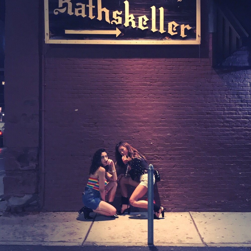 Rathskeller Pub - two women sitting on the sidewalk - Dance Clubs Near Me - Binghamton, New York Rathskeller Pub - two women sitting on the sidewalk - Dance Clubs Near Me - Binghamton, New York